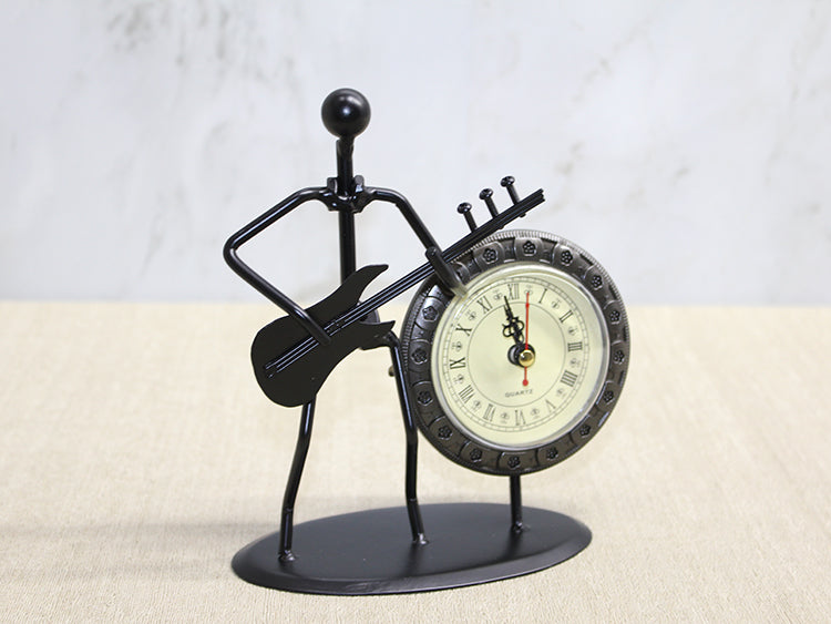 Musician Playing Guitar with Metal Clock